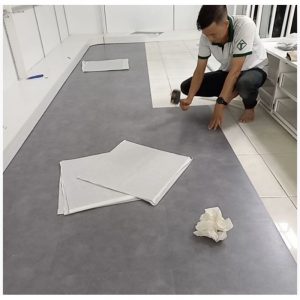 thi công sàn nhựa giả đá thực tế